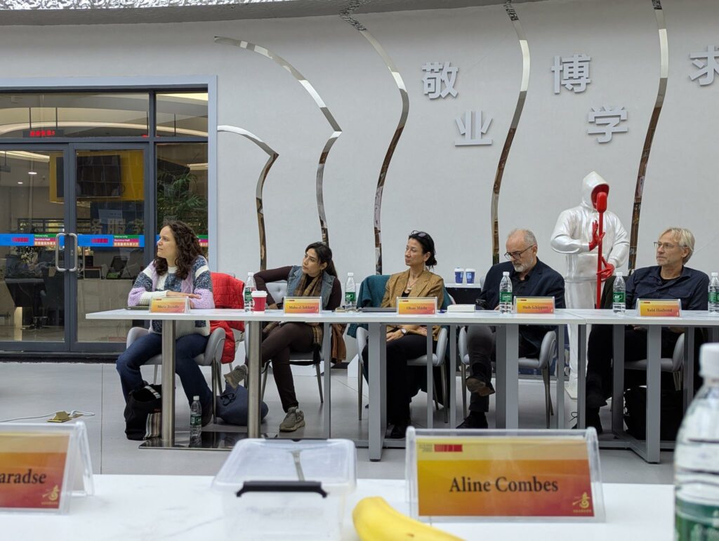 aline's colleagues during speech